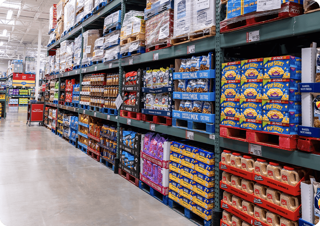 Image: Pallets of merchandise in a warehouse-style store.