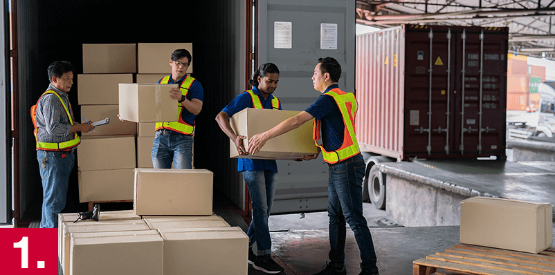 Image: People unloading boxes from a truck.